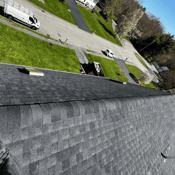New dark architectural asphalt shingles seen from the ridge