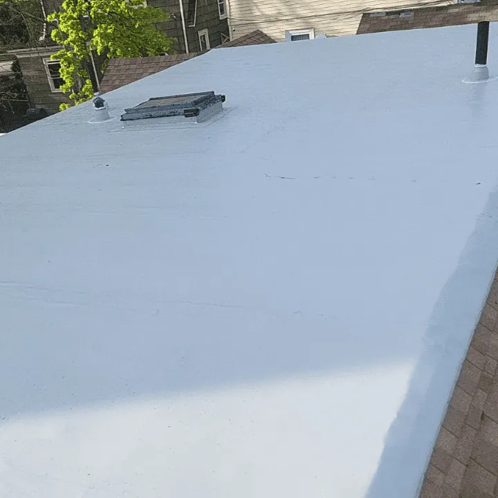 New white membrane flat roof with a roof hatch